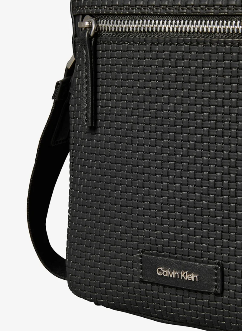 CALVIN KLEIN Black Embossed Woven Reporter Bag for Men | Best Price UAE